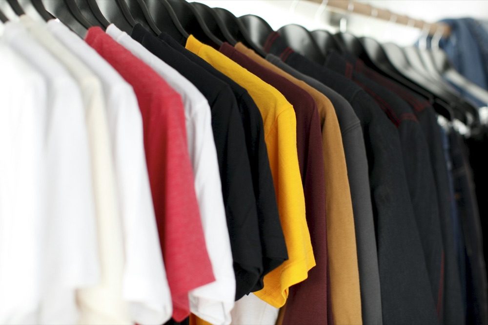Craffted brand photography: shirts on a rail.